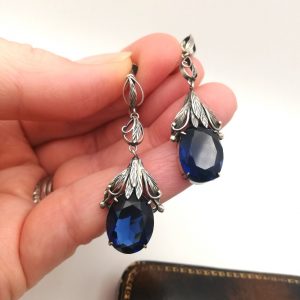 Sumptuous chandelier type earrings by Bernard Instone with sapphire pastes, late 1920s