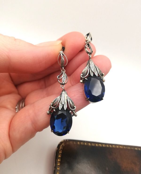 Sumptuous chandelier type earrings by Bernard Instone with sapphire pastes, late 1920s