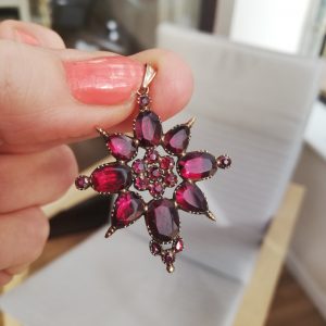Georgian 1800s foiled flat-cut garnets and gold Maltese Cross pendant