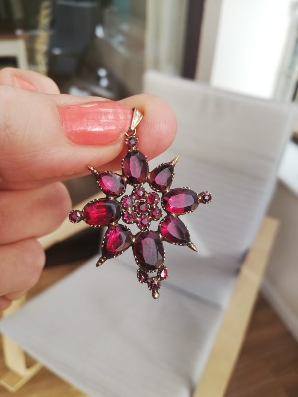 Georgian 1800s foiled flat-cut garnets and gold Maltese Cross pendant
