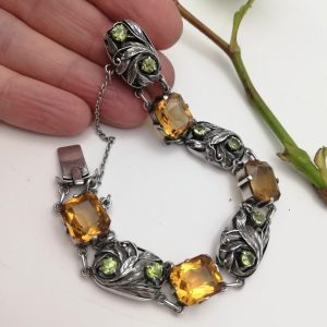 Lovely Bernard Instone book piece Arts and Crafts foliate bracelet with citrines and peridots c1930
