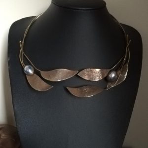 Structural foliate studio collar necklace from London 1986 in textured silver gilt with grey blister pearls
