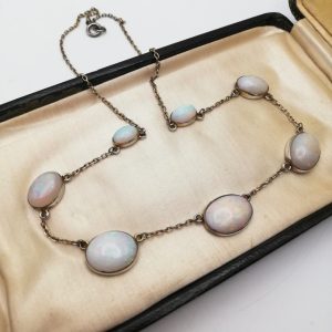 Edwardian c1910 silver gilt station necklace with graduated white opals