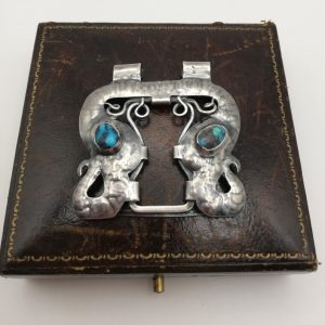 1906 Oliver Baker for Liberty & Co half waist clasp as pendant with turquoise