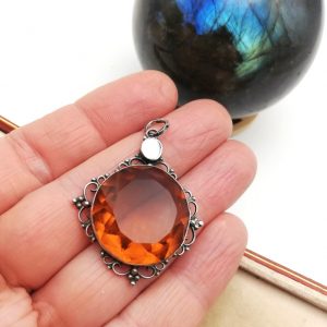 c1900 hand-crafted Arts and Crafts silver pendant with large topaz paste and mother-of-pearl