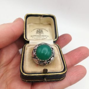 English Arts and Crafts ring by Charles and Gladys Mumford in silver foliate design with chrysoprase