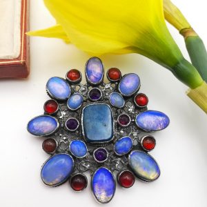Amy Sandheim unique and impressive Arts and Crafts brooch with foiled water opals and other gemstones 1920s