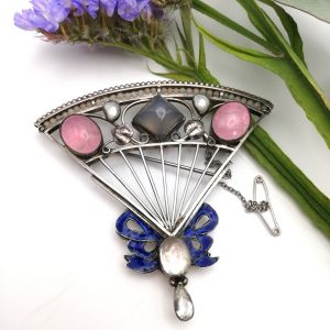 George Hunt book piece and impressive Arts and Crafts fan design brooch with enamel ribbon detail
