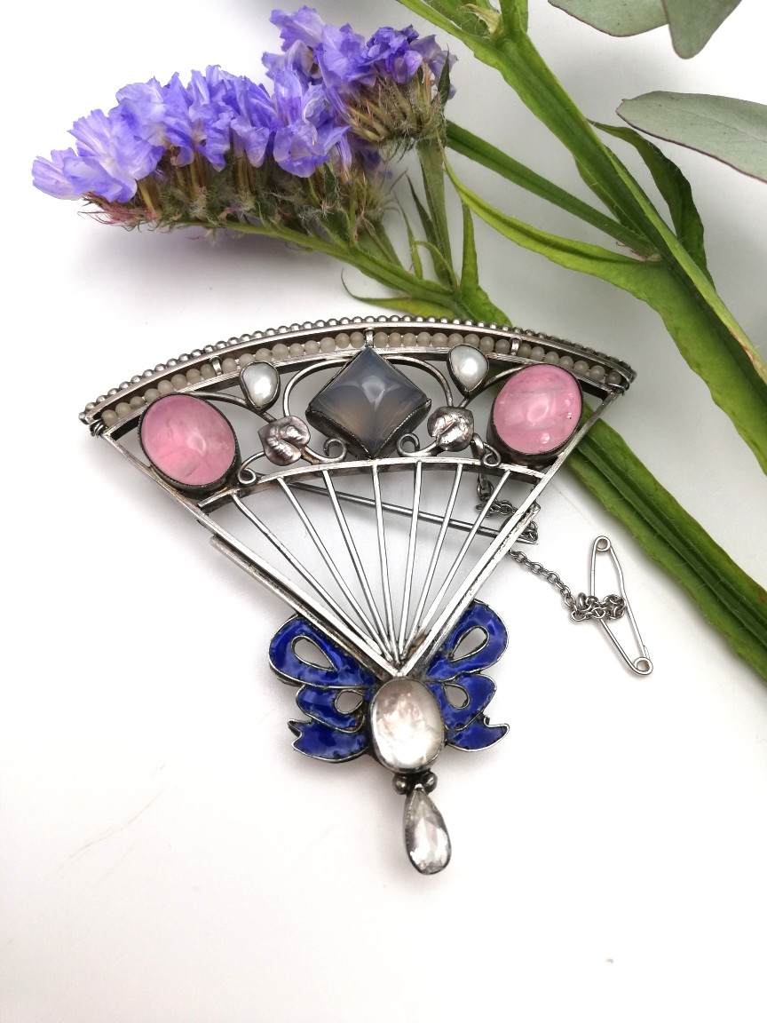 George Hunt book piece and impressive Arts and Crafts fan design brooch with enamel ribbon detail