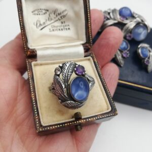 Rare Bernard Instone Arts and Crafts ring with foiled rose quartz and amethyst- museum standard