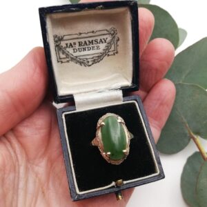 Vintage engraved gold and claw-set jade ring in a larger size