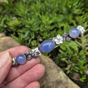 Amy Sandheim Arts and Crafts blue chalcedony grape vine brooch c1920s