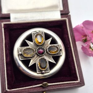 Antique Victorian Scottish star burst brooch in silver with citrines and garnet