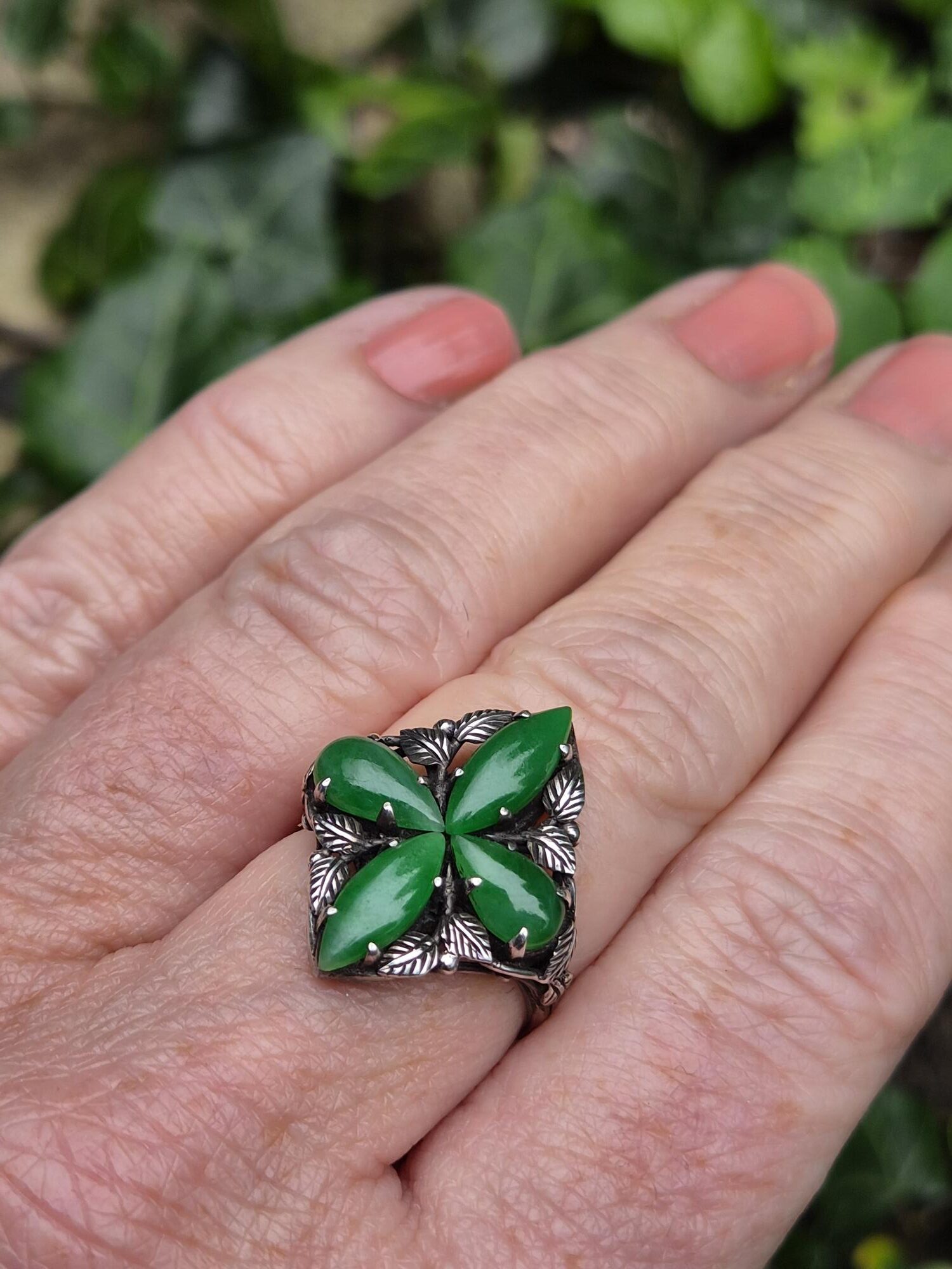 Early 1920s Bernard Instone superlative Arts and Crafts ring with jade clover and silver foliate details