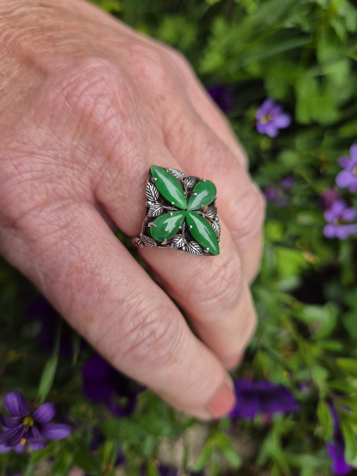 Early 1920s Bernard Instone superlative Arts and Crafts ring with jade clover and silver foliate details