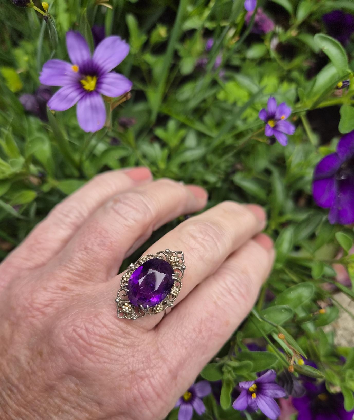 Rare early Bernard Instone silver and gold Arts and Crafts book piece ring with striking amethyst