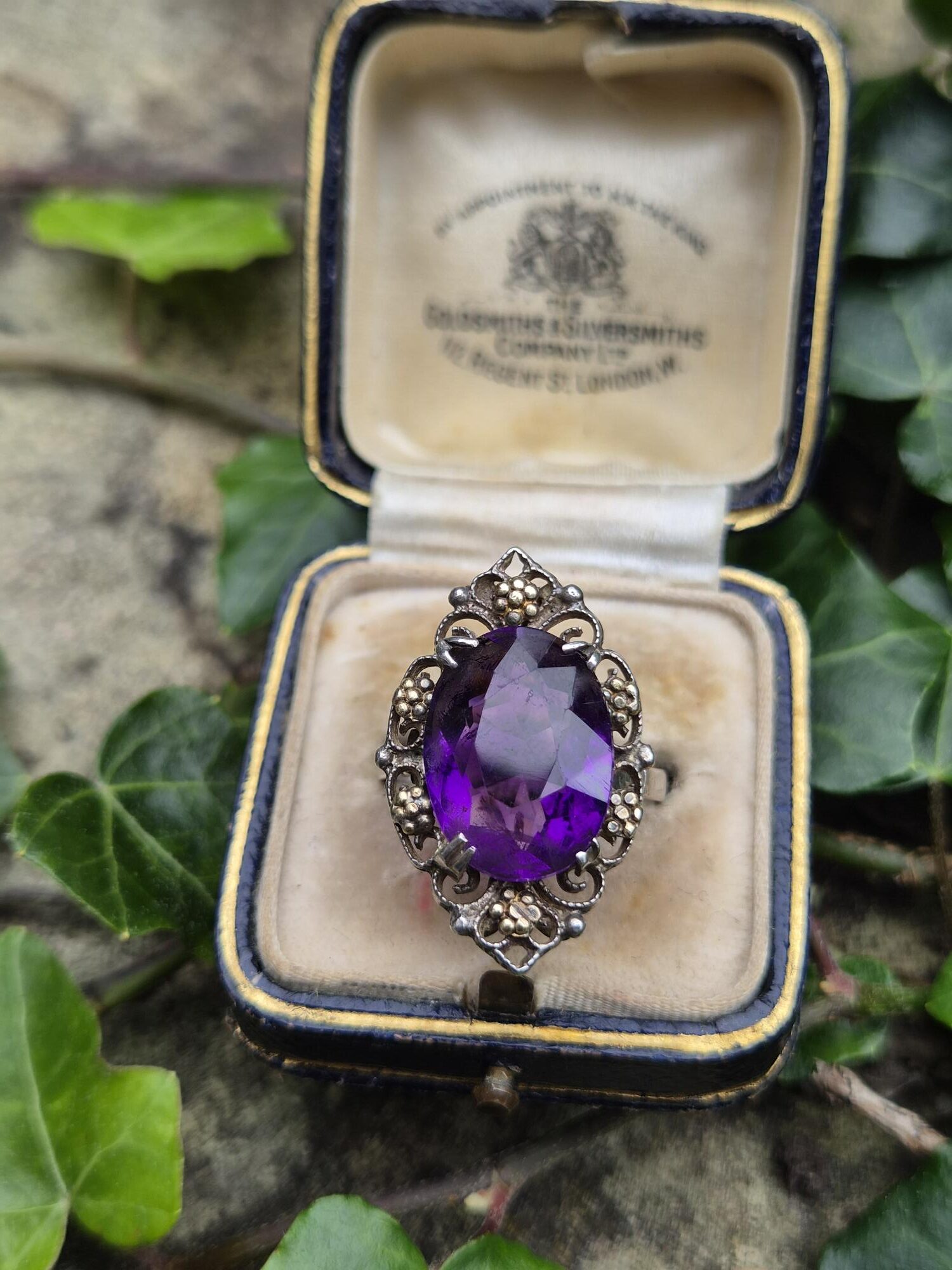 Rare early Bernard Instone silver and gold Arts and Crafts book piece ring with striking amethyst