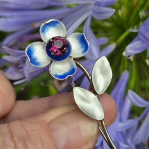 Bernard Instone 1930s Arts and Crafts white and blue enamel flower brooch with purple stone