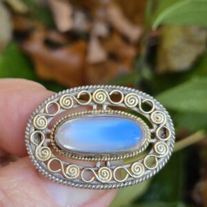 c1920 Arts and Crafts brooch in silver and gold with lovely blue moonstone